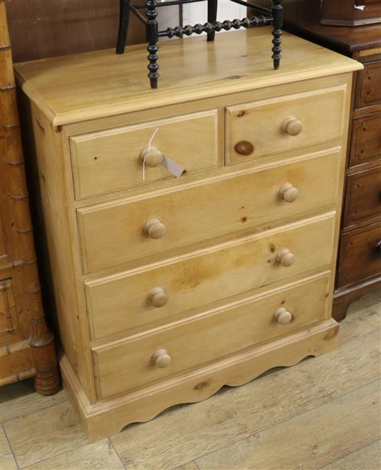 A modern pine five drawer chest W.86cm